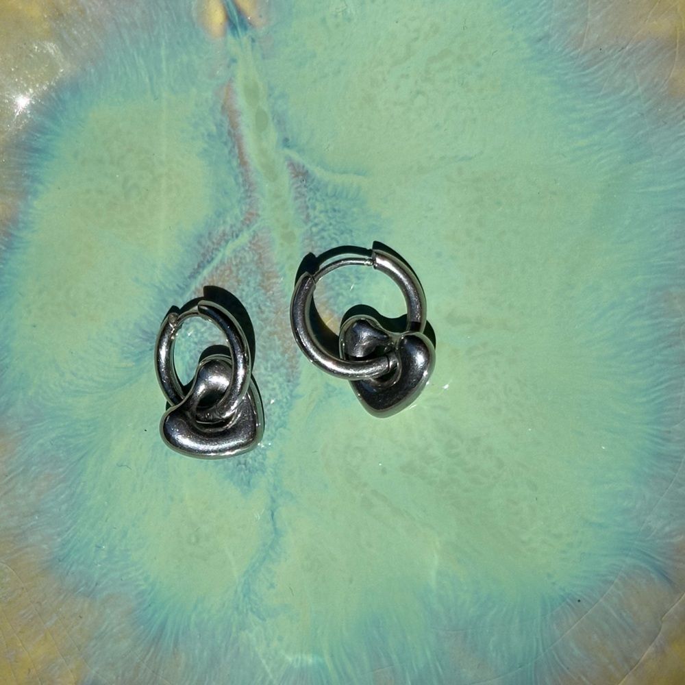 Chunky silver heart dangle hoops
